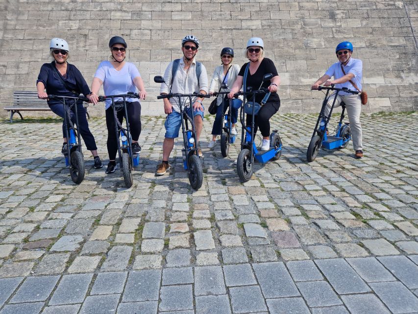 3-H Munich: Top Sights E-Scooter Tour with Local Guide - The Eisbach surfers and the Chinese Tower