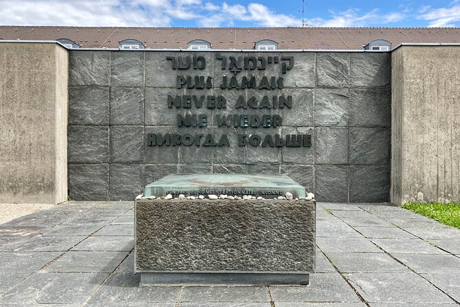 Dachau Concentration Camp Private Tour by Train from Munich - Museum documents, photographs, and the English documentary