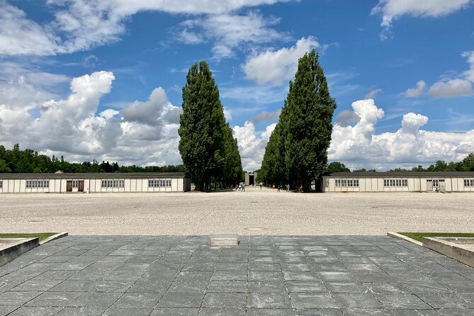 Dachau Concentration Camp Private Tour by Train from Munich - Entering through the Arbeit macht frei gate